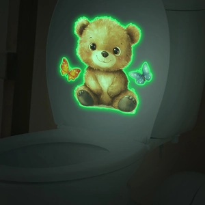Luminous cute bear wall sticker showing bright green glow-in-the-dark effect in bedroom
