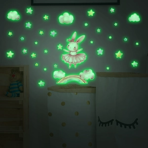 Luminous wall sticker detail showing glow-in-the-dark ballet bunny, stars, and rainbow for kids
