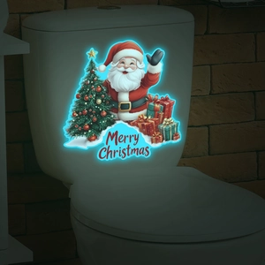 Luminous Santa Claus and Christmas tree toilet sticker with blue glow effect in the dark