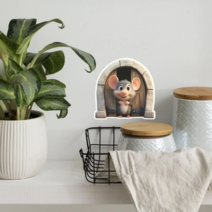 Detailed view of cartoon mouse hole wall sticker on a white wall in a cozy home setting