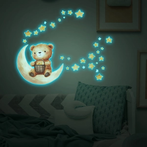 Luminous wall sticker showing a cute bear on the moon with glowing stars in the dark