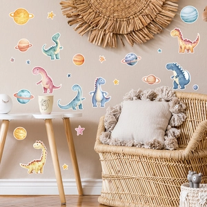Luminous cartoon dinosaur and planet wall stickers in a cozy Nordic nursery setting
