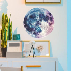 Glow-in-the-dark moon wall sticker with blue star texture for kids' bedroom decor