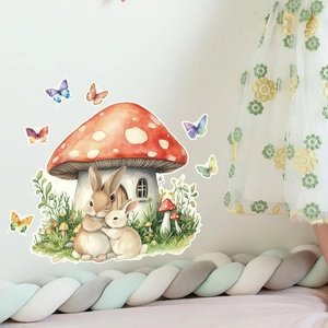 Luminous mushroom house and rabbits wall stickers in a cozy nursery room setting
