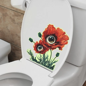 Luminous toilet sticker showing surreal red poppy flowers with realistic eyeball centers