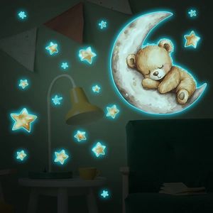 Glow in the dark wall stickers featuring a sleeping bear on the moon with luminous stars