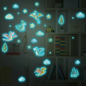 Stickers muraux lumineux de dragons et étoiles brillant en bleu dans le noir complet