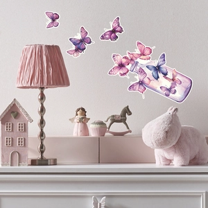 Luminous wall decals featuring purple butterflies and a drifting bottle in a bedroom