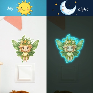 Luminous forest fairy wall sticker showing day and night glow effects on light switch