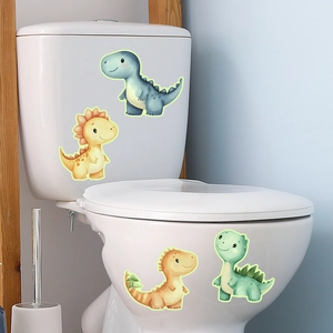 Luminous watercolor dinosaur wall decals applied to a white toilet tank in a bathroom