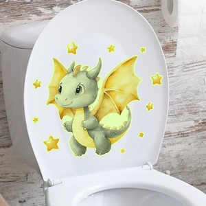 Luminous cute cartoon dinosaur and stars sticker applied on a white toilet lid