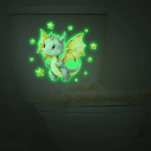 Luminous cute dinosaur and stars toilet sticker with green glow effect in dark bathroom