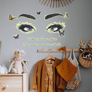 Luminous wall stickers featuring purple eyes, butterflies, and motivational English quotes