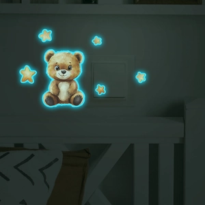 Luminous wall stickers featuring a cute brown bear and five glowing blue-green stars