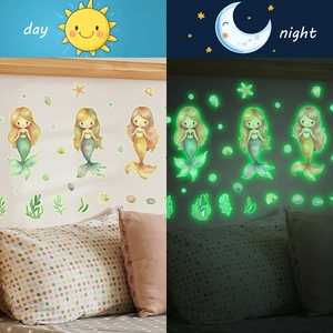 Luminous mermaid wall stickers showing day and night glow effects for kids room