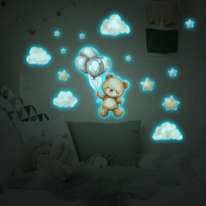 Luminous wall stickers featuring cartoon bear with balloons and stars in dark bedroom