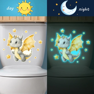 Glow-in-the-dark cartoon dinosaur and stars stickers in day and night contrast view