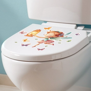 Close-up of a glowing fairy and butterflies self-adhesive sticker on a toilet lid
