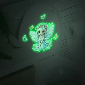 Glow-in-the-dark toilet decal featuring a fairy with butterflies in green fluorescent light
