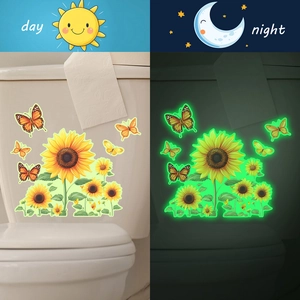 Luminous sunflower and butterfly wall stickers showing day and night glowing effects
