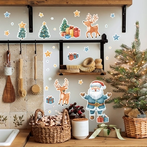 Luminous Christmas wall stickers with Santa, elk, and stars in a warm kitchen setting