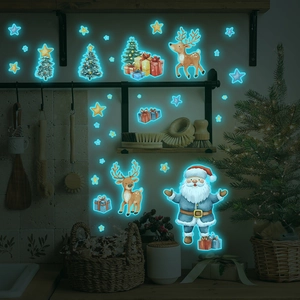 Glow-in-the-dark Christmas wall stickers featuring Santa and reindeer in a dark room