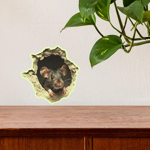 Realistic 3D mouse in a broken wall hole wall sticker on a beige textured surface