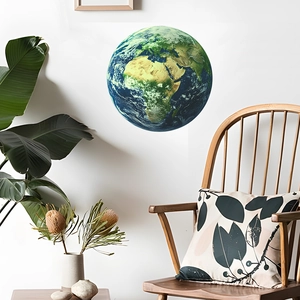 Luminous earth wall decal sticker applied on a white wall in a modern living room setting