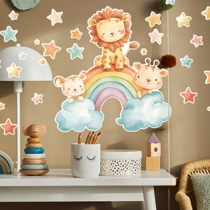 Détail de stickers muraux aquarelle avec lion, arc-en-ciel et étoiles dans une chambre d'enfant
