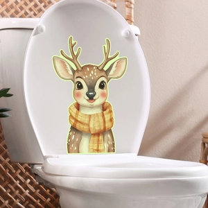 Glow-in-the-dark watercolor deer sticker with yellow scarf on white toilet lid