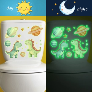 Luminous cartoon dinosaur and planet wall stickers showing day and night glowing effects