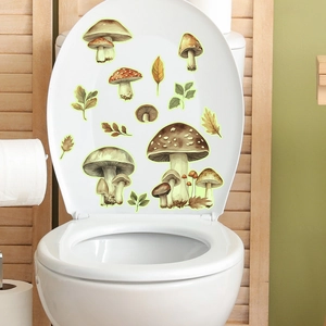 Glow-in-the-dark mushroom stickers shown on a toilet lid with a nature-inspired design