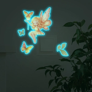 Glow in the dark wall sticker showing a fairy and butterflies in blue phosphorescence