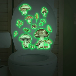 Glow-in-the-dark mushroom and leaves wall decals set applied to a bathroom toilet lid