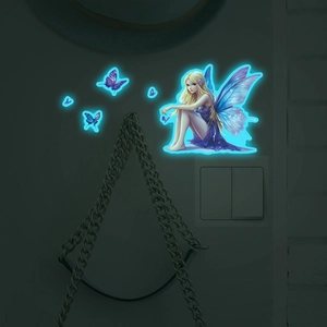 Luminous wall sticker featuring a sitting fairy and butterflies glowing in the dark