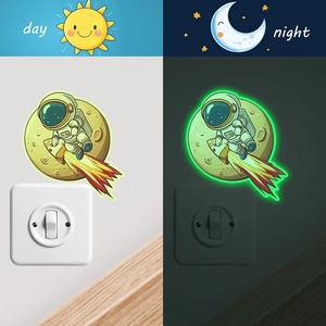Luminous astronaut and rocket wall stickers with green glow for light switch decoration