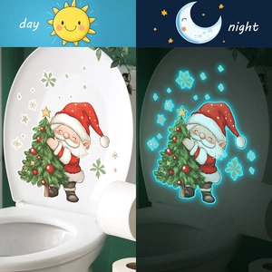 Sticker abattant WC Père Noël lumineux avec effet brillant de jour comme de nuit déco