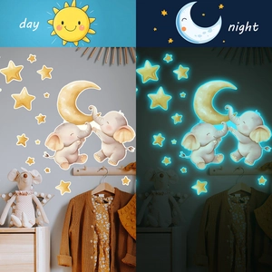 Glow in the dark elephant wall stickers for nursery showing day and night luminous effects