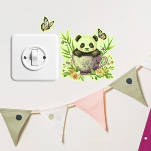 Luminous wall sticker with cute panda in tea cup next to light switch on white wall