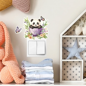 Glow-in-the-dark panda in teacup switch sticker on white wall for home decor