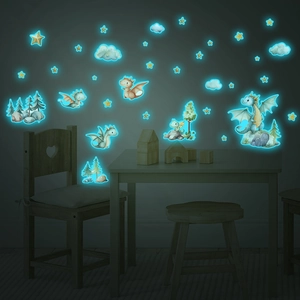 Glow in the dark dinosaur and star wall stickers showing luminous green effect at night
