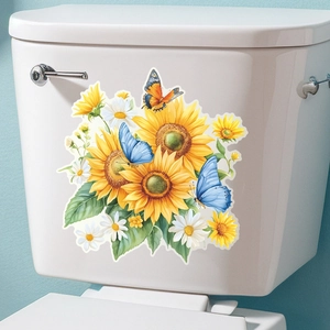 Detail of floral sunflower and butterfly wall stickers applied on white ceramic toilet