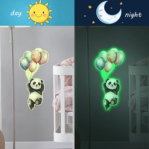 Luminous wall sticker showing cartoon panda with balloons in day and night views