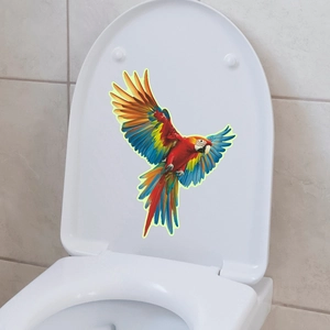 Close-up of a colorful parrot wall sticker in flight on a white bathroom toilet lid