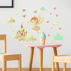 Luminous fairy and castle wall decals shown in a cozy nursery room setting