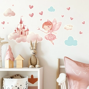 Detailed view of fairy castle wall stickers with pink fairy and clouds in a nursery