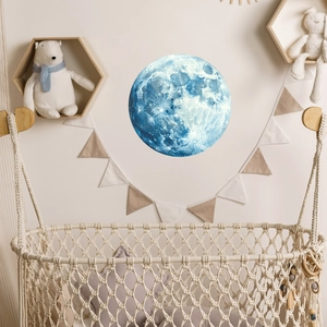 Luminous moon wall sticker showing realistic crater details in a cozy bedroom setting