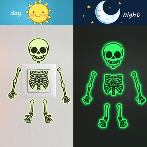 Luminous Halloween skeleton wall stickers for light switches showing day and night effect