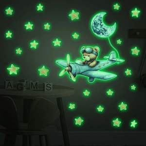 Luminous wall sticker set featuring cartoon bear flying a plane with stars and moon