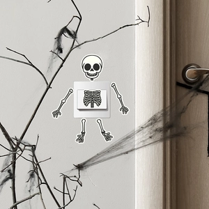 Close-up of Halloween skeleton switch stickers with rib cage pattern on white panel